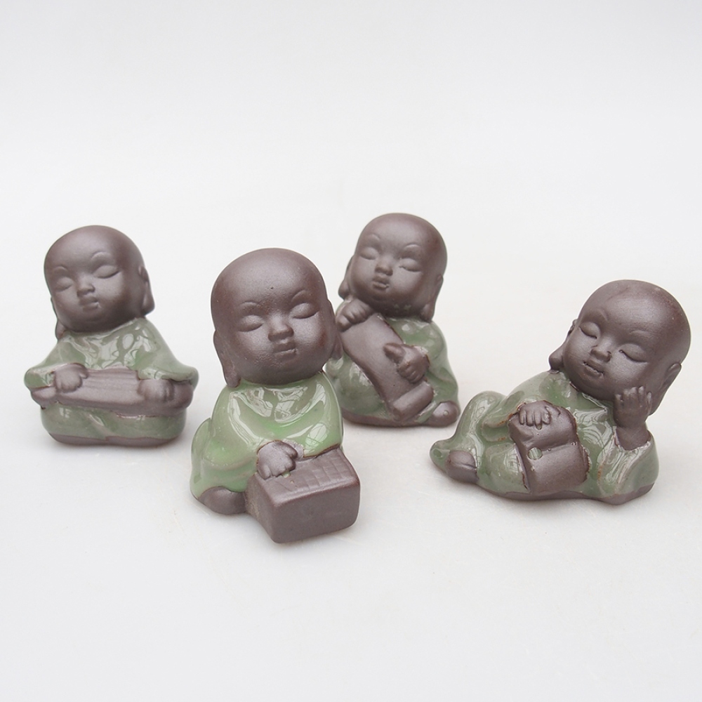 Statuetta in ceramica 4 pezzi