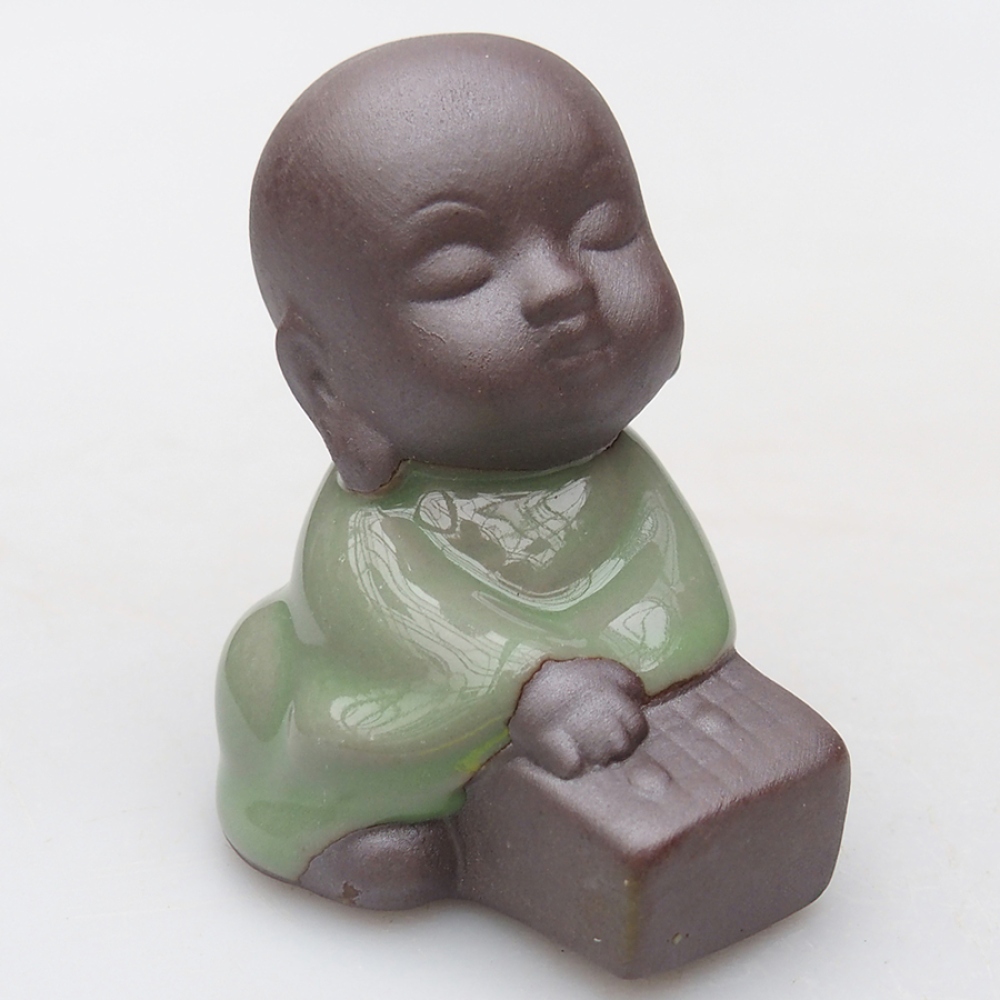 Statuetta in ceramica 4 pezzi